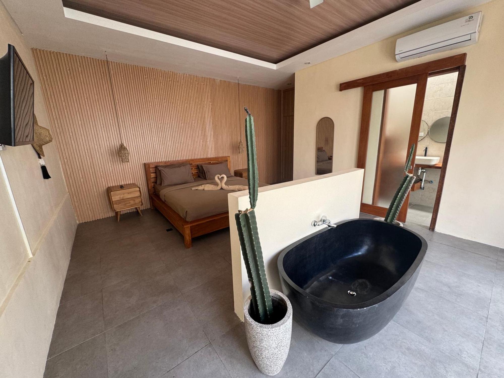 Kiki Village Bathtub Canggu Esterno foto